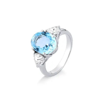 Anel Moissanite com Topazio Azul Oval em Prata com Banho de Rodio
